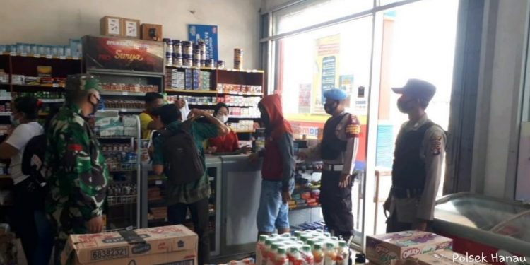 Polsek Hanau Terus Lakukan Himbauan Prokes Tegakkan Ops Yustisi