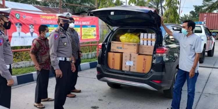 Sat Lantas Polres Seruyan Kawal Vaksin Covid-19