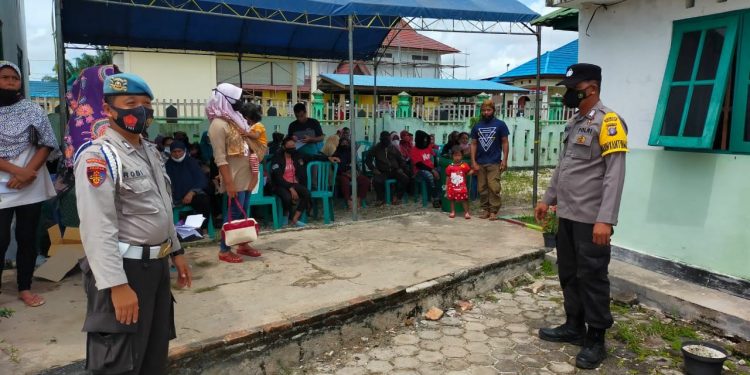 Sukseskan Giat Vaksinasi Massal, Polsek Danau Sembuluh Kunjungi UPTD Puskesmas