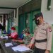 Polsek Danau Sembuluh Amankan Vaksinasi di Puskesmas Terawan