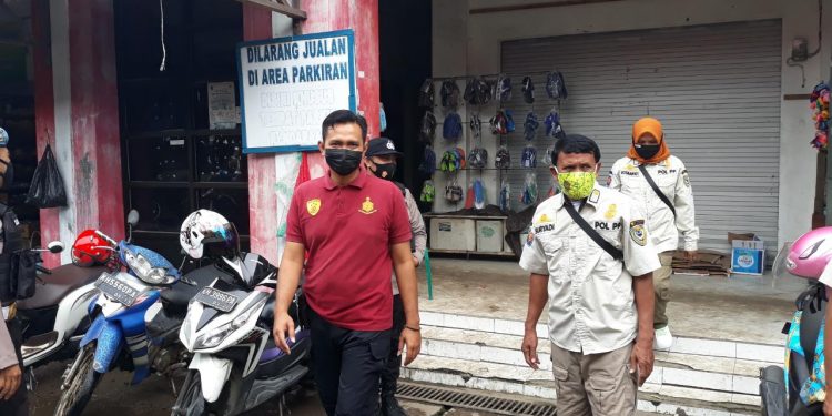 Bersama Satpol PP Seruyan, Polsek Seruyan Hilir Melaksanakan Yustisi   