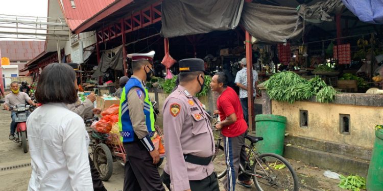 Anggota Satreskrim Laksanakan Giat Yustisi di Pasar Saik Kuala Pembuang