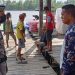 Satpolairud Polres Seruyan Sambang Warga, Berikan Himbauan Prokes
