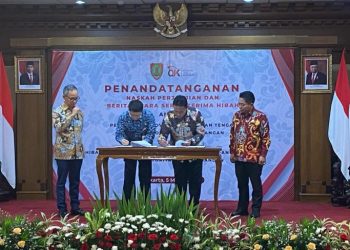 Wagub Edy Pratowo Bersama Ketua Dewan Komisioner OJK RI Tandatangi NPHD BAST Barang Milik Pemprov Kalteng