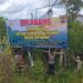 Satgas Bina Karuna Polda Kalteng Pasang Baliho Imbauan Cegah Karhutla di Jembatan Bukit Rawi