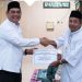 Pemkab Barito Utara Serahkan Hibah untuk Masjid Al Arafah