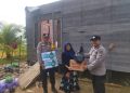 Polsek Kurau Bantu Sembako Warga Terdampak Angin Kencang